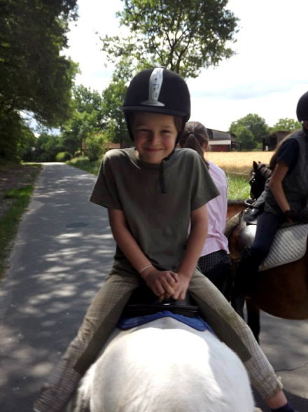 Kind mit Pferd